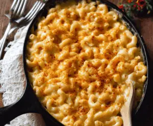 Creamy stovetop Gouda mac and cheese served in a bowl, garnished with fresh herbs.